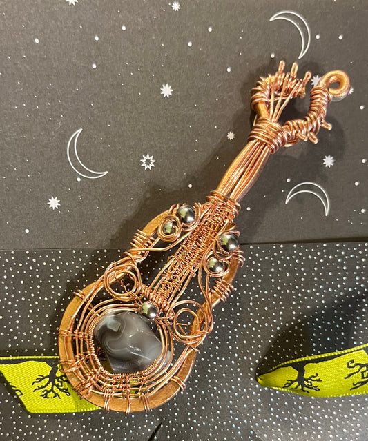 Copper wire wrapped guitar pendant